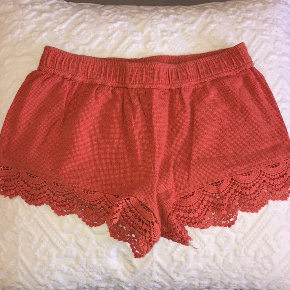 Orange knit short with fringe